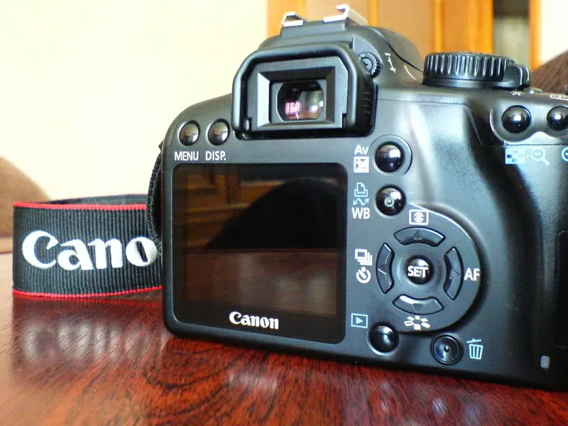 Продам Canon EOS 1000D 18-55 kit + сумка + карта памяти  2