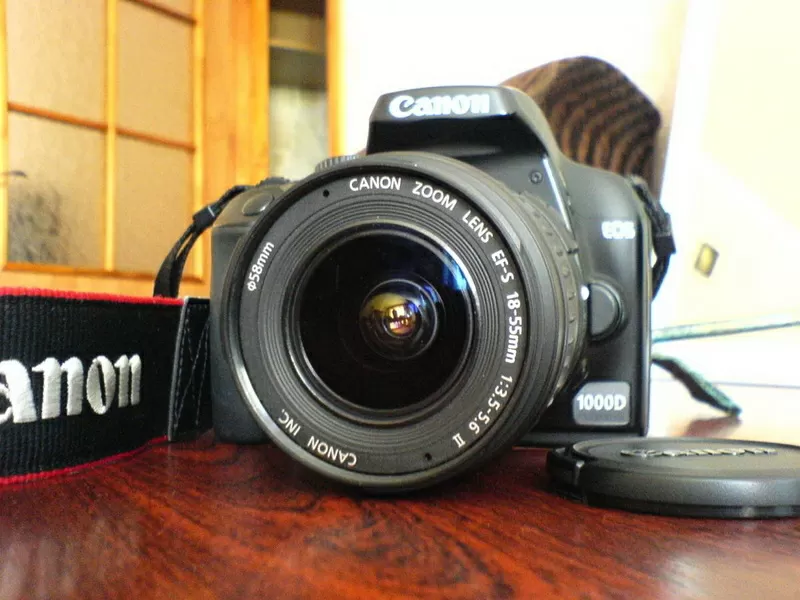 Продам Canon EOS 1000D 18-55 kit + сумка + карта памяти  3