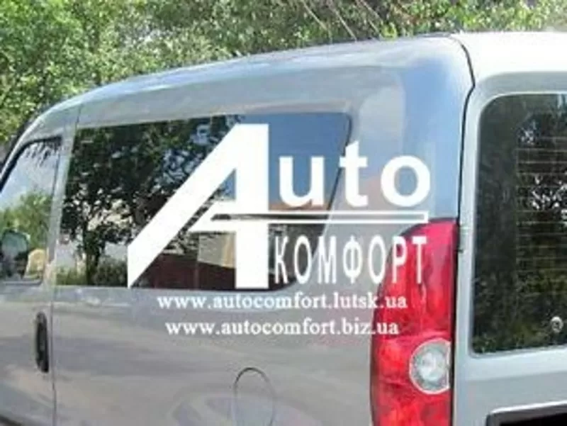 Задний салон,  левое окно,  короткая база на Fiat Doblo 2010-