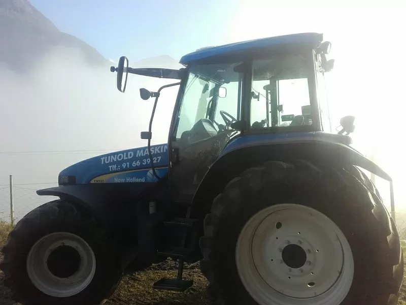 Трактор New Holland TM155 4